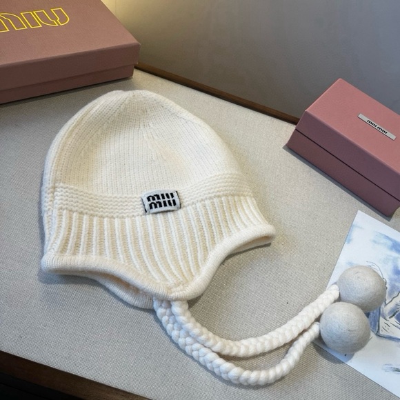 Miu Miu Accessories - Miu Miu Cream Knit Hat with Pom Poms